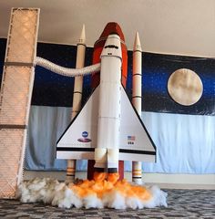 a space shuttle on display in a room