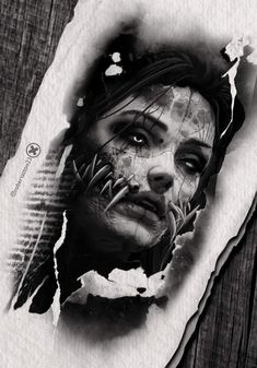 a black and white photo of a woman's face with torn paper on it