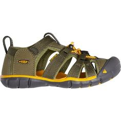 The Seacamp II CNX Sandal is a versatile piece of footwear our young ones can wear anywhere. Its open polyester upper ensures fresh feet throughout the day while also keeping them comfortable thanks to how soft it is. And speaking of comfort, the EVA footbed has ample cushioning for long days of riverbed exploring with the parents. Sporty Slip-on Sandals For Outdoor, Green Synthetic Sport Sandals, Sporty Slip-resistant Sport Sandals For Outdoor Activities, Green Synthetic Sport Sandals With Rubber Sole, Green Sporty Sandals For Sports, Green Cushioned Sport Sandals, Functional Green Sports Sandals, Green Functional Sports Sandals, Green Open Toe Sports Sandals