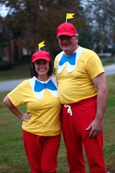 two people dressed up as pokemon and pikachu, one is wearing a red hat