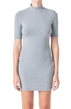 This throw-on-and-go minidress in a curve-hugging silhouette is the perfect choice when you're feeling lazy but still want to look like you made an effort (but not too much effort). Slips on over head Mock neck Short sleeves 95% polyester, 5% spandex Hand wash, dry flat Imported Jumpsuit Fall, Knitwear Trends, Knit Loungewear, Feeling Lazy, Mock Neck Mini Dress, Strapless Bodycon Dress, Tweed Dress, Leather Dresses, Romper With Skirt