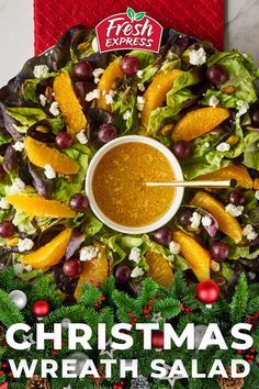 a christmas wreath salad with oranges and cranberries