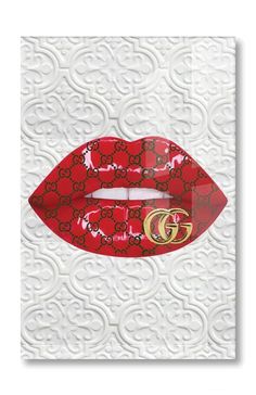 a red lipstick with gucci logo on it's lip and the word gg written