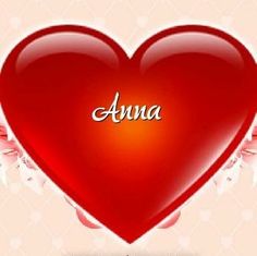 a red heart with angel wings and the word ann on it's back ground