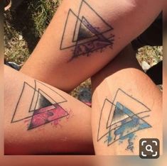 two people with tattoos on their legs