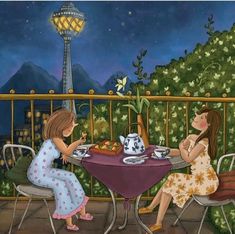 two women sitting at a table with tea and food in front of the night sky