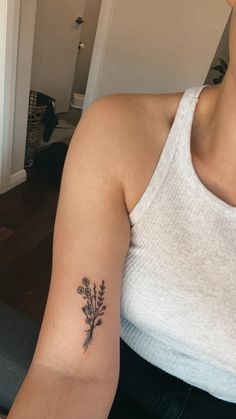 tattoo Flower Tattoo On Bicep, Single Larkspur Flower Tattoo, Top Of Bicep Tattoo, Minimalist Dainty Tattoo, Small Flower Arm Tattoo, Dainty Flower Forearm Tattoo, Flower Tattoo Bicep, Bicep Flower Tattoo Women, Wildflower Tattoo Placement