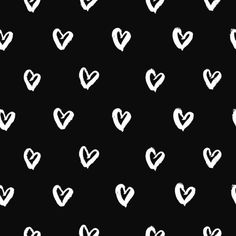 white hearts drawn on black background