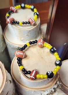 Black and Gold Football 8 Ball Bracelet Gold Football, Doll Jewelry, Ball Bracelet, 8 Ball, Black And Gold, Arm Band, Doll Toys, Toys Games, Doll Clothes