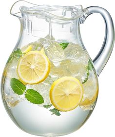 a pitcher filled with ice and lemon slices