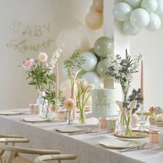 a table set up for a baby shower party