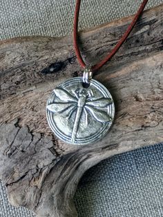 "You can find more silver treasures in my shop! Click here: https://www.etsy.com/shop/SeasideSilverJewels Or follow me on Facebook: https://www.facebook.com/SeasideSilverJewels/ The dragonfly is a magic part of our fun summer days. I can only try to capture the beauty of this amazing insect. SIZE AND DETAIL: It's about 1' long and 1\" wide. Each pendant contains approximately 5.0 grams of fine silver. I handcraft each piece so weight may vary slightly. All my materials are recycled and/or natura Silver Bohemian Jewelry For Everyday, Bohemian Silver Dragonfly Necklace, Handmade Bohemian Dragonfly Necklace, Bohemian Handmade Dragonfly Necklace, Casual Bohemian Silver Jewelry, Silver Bohemian Necklace, Silver Bohemian Necklace For Everyday, Insect Necklace, Art Clay Silver