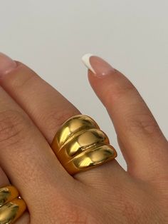 The WILLOW CHUNKY GOLD RING is a stunning statement piece, crafted from durable stainless steel and coated with 18k PVD gold. Its chunky design adds a touch of boldness to any outfit. Elevate your style with this eye-catching ring. Details: Waterproof Tarnish free Hypoallergenic Leggings Hoodie, Ice Ice Baby, Jumpsuit Jacket, Chunky Rings, Toe Rings, Ring Bracelet, Jacket Tops, Ring Shopping, Gold Ring