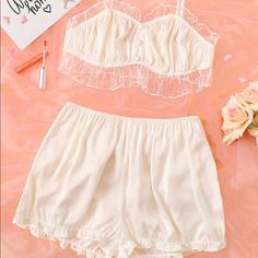 Mesh Trimmed Night Set With Ruffle Hem In Cream Colored Satin. The Bra Top Has Adorable Button Details, And The Shorts Are High Waisted And Super Flattering. Brand New ! Never Worn ! Size M Bust: 30.7-52 “ Waist: 26.8-47.2 “ Hip: 48 Bra Top Length: 12.2 “ Shorts Length: 12.3 “ White Sheer Sleepwear For Sleepovers, White Lace Trim Pajama Shorts For Sleep, Lingerie Gown, Green Lingerie, Night Set, Floral Lingerie, Holloween Costume, Pink Corset, Lace Cami Top