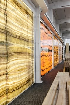 the inside of an office building with wooden slats