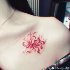 a woman with a tattoo on her chest