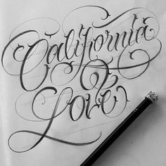 the words california love written in cursive writing on paper with a black pen