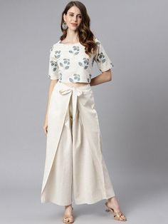 Women White & Light Beige Printed Crop Top with Draped Palazzos, Indo Western Ethnic Set, Printed Crop top with palazzo, Fusion Outfit VitansEthnics Bohemian Cotton Cream Set, Bohemian Cream Cotton Set, Traditional Beige Printed Sets, Cream Cotton Short Sleeve Sets, Casual Beige Floral Print Sets, Beige Cotton Sets With Printed Motifs, White Bohemian Short Sleeve Sets, Off White Bohemian Summer Sets, Bohemian Off White Summer Sets