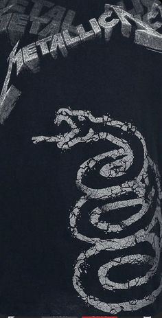 the back of a black shirt with an image of a snake on it