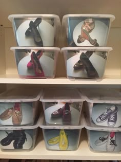 several plastic containers filled with shoes on top of a white shelve shelf in a room