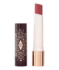 Find CHARLOTTE TILBURY Hyaluronic Happikiss on Editorialist. Hyaluronic Acid-infused hydrating LIPSTICK BALM in a berry shade your lips will love! Charlotte Tilbury Hyaluronic Happikiss, Charlotte Tilbury Vintage Vamp, Charlotte Tilbury Hyaluronic Happikiss Pillow Talk, Charlotte Tilbury Hyaluronic Happikiss Lipstick Balm, Charlotte Tilbury Collection, Charlotte Tilbury Makeup Collection, Hydrating Lipstick, Brown Shades, Pink Pillows