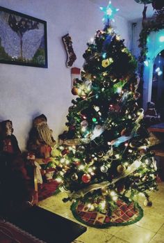 a decorated christmas tree in a living room