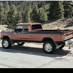 a brown truck parked on the side of a road