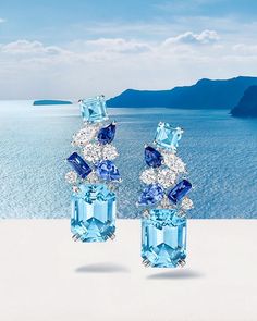 Santorini, one of the most magical places in the world, inspires these one-of-a-kind jewels. With exquisite aquamarines enlivened by sapphires and diamonds, these Santorini Earrings sparkle like the Greek locale’s tranquil blue waters. #Majestic Escapes #HighJewelry #HarryWinston Bask in bejeweled beauty. Harry Winston Jewelry, Tranquil Blue, Expensive Diamond, Art Jewelry Design, Harry Winston, Places In The World, Fancy Jewelry, I Love Jewelry, Magical Places