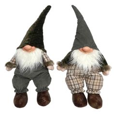 two garden gnomes are standing next to each other