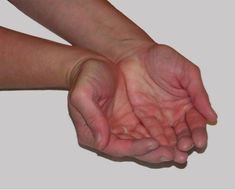 two hands reaching out towards each other