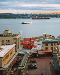 an aerial view of the public market center in seattle's inner harbor area, with boats on the water