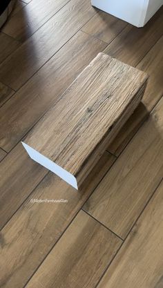 a piece of wood that is laying on the floor