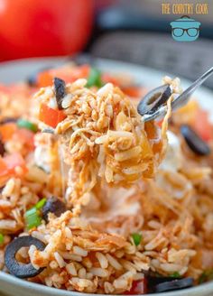 a spoon full of rice and vegetables with the title overlay above it that says easy chicken casserole