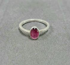 - PRODUCT TYPE - 925 SILVER PINK TOURMALINE RING - MATERIAL - SILVER - PURITY - 925 - TOTAL WEIGHT - 2.130 GRAMS - STONE WEIGHT - 1.65 CARATS - SILVER WEIGHT - 1.800 GRAMS Minimal & Simple, Dainty Handmade Bands.Understated Luxury. - Delicate Handmade Silver Ring. - Made to order, just for you. Anirudh Gems Store :- https://www.etsy.com/uk/shop/ANIRUDHGEMSStore?ref=search_shop_redirect -Quality is guaranteed. Our mission is always to satisfy our customers with our offerings, so just relax an Pink Ruby Ring In Sterling Silver, Pink Oval Ruby Ring In Sterling Silver, Handmade Pink Ruby Ring In Sterling Silver, Gem Rings Stones, Handmade Bands, Silver Ring With Stone, Gemstone Stacking Ring, Pink Tourmaline Ring, Simple Ring