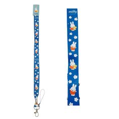 a blue lanyard with bunny and carrots on it