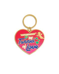 a heart shaped keychain with the words tunnel of love on it