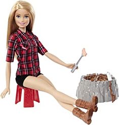 a barbie doll sitting on a stool holding a knife