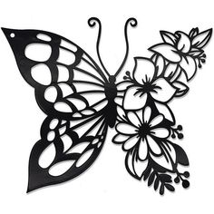 a metal butterfly with flowers on it's wings