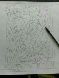 a drawing of flowers on paper with a pencil