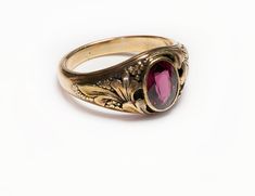 Almandine Garnet Men's Ring.Art Nouveau 14K yellow gold almandine garnet men's ring. Rings size 10.5. Ring has not been polished and therefore it has its original patina. Nowadays, rings come in a variety of interesting designs and high-quality materials, some of which are adorned with precious and semiprecious stones. And when it comes to the vintage and antique ones, you definitely have many exquisite models to explore. Please view our collection of rings. Antique Vintage Rings Vintage Mens Rings Antiques, Vintage Men Jewelry, Men Gemstone Ring, Vintage Ring Men, Stone Ring Design Gold Men, Mens Garnet Ring, Antique Mens Rings, Stone Rings For Men, Masculine Jewelry