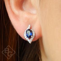 Add a dramatic splash of color and sparkle to your ensemble with these 1.29 carats total weight sapphire and diamond earrings. Brilliant 0.22 carats pavé diamonds set in 14 white gold form a modified pear shaped halo around regal oval cut sapphires. Also available in 14K or 18K white, rose or yellow gold as well as palladium and platinum. Includes earring box Includes jewelry appraisal Ships fully insured to point of delivery Free shipping on this item All orders placed out of NY state (ordered Elegant Gia Certified Oval Diamond Earrings, Elegant Oval Diamond Cut Earrings, Formal Gia Certified Oval Earrings, Formal Rose Gold Oval Diamond Earrings, Fine Jewelry Oval Earrings With Brilliant Cut, 14k Gold Oval Earrings With Brilliant Cut, 14k Gold Oval Earrings With Diamond Cut, Oval 14k Gold Diamond Cut Earrings, Oval Diamond Cut 14k Gold Earrings