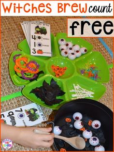 a green tray filled with halloween themed items