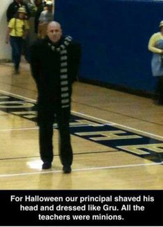 an older man standing on top of a basketball court wearing a black and white striped shirt