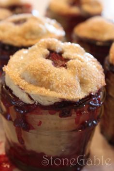 several small desserts are sitting on a table