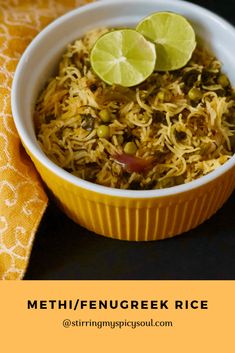 a bowl filled with rice and lime slices