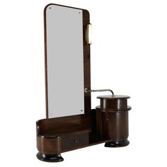 a wooden vanity with mirror and stool