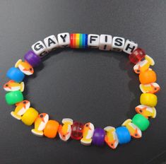 Kandi Color Schemes, Random Bracelet Ideas, Bracket Inspo Beads, Scenecore Kandi Ideas, Bracelet Ideas Colors, Funny Words To Put On Bracelets, Fun Bracelet Ideas, Candy Bead Bracelet Ideas, Kandi Bracelets Ideas Words