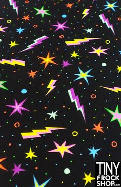 a black background with colorful stars and confetti