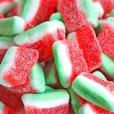 there is a pile of red, white and green candy