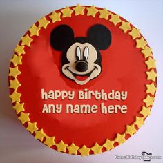 a mickey mouse birthday cake with the words happy birthday dev on it's face